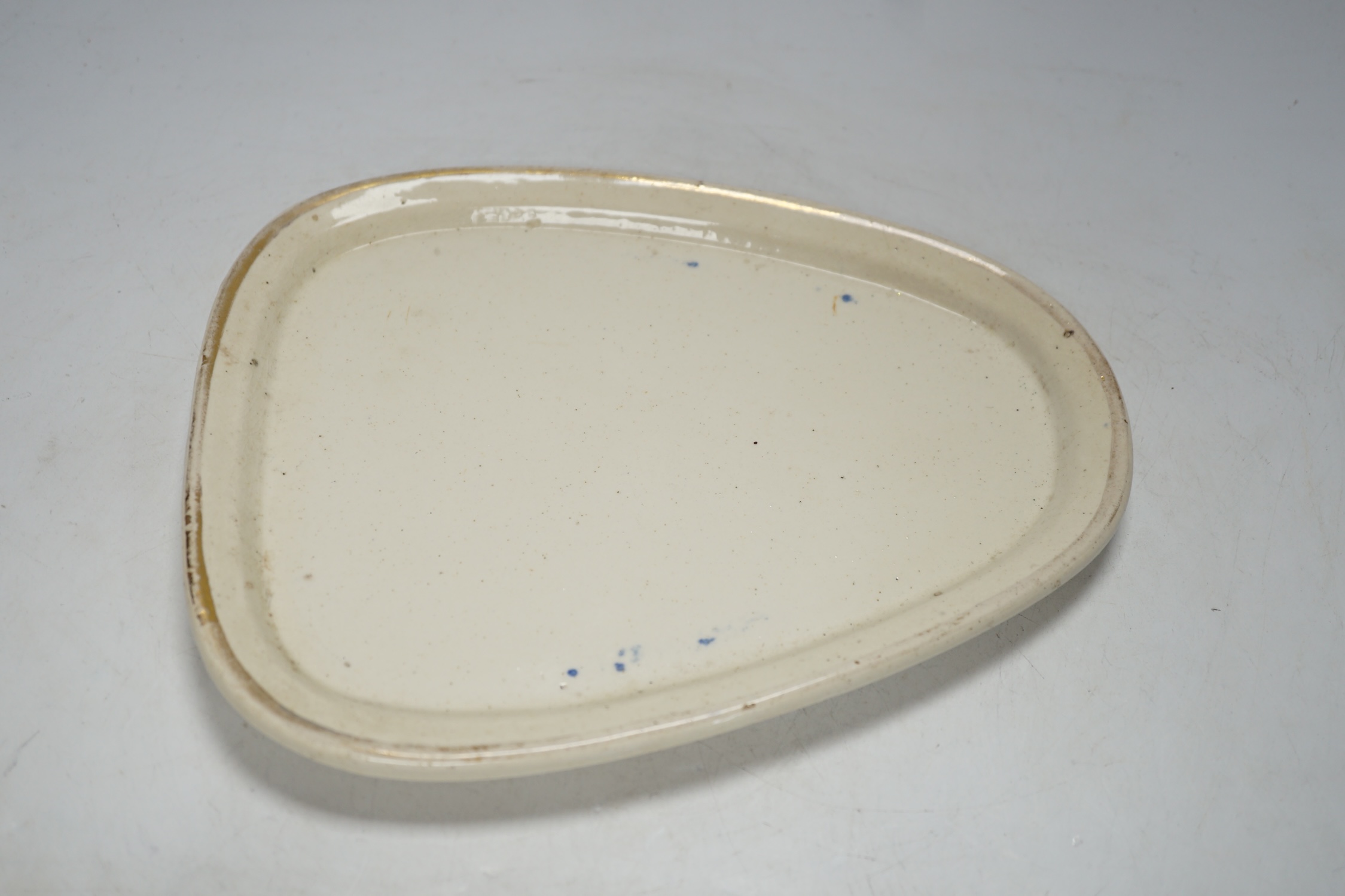 A Victorian ‘cows head’ pottery cheese dish and cover, 18cm